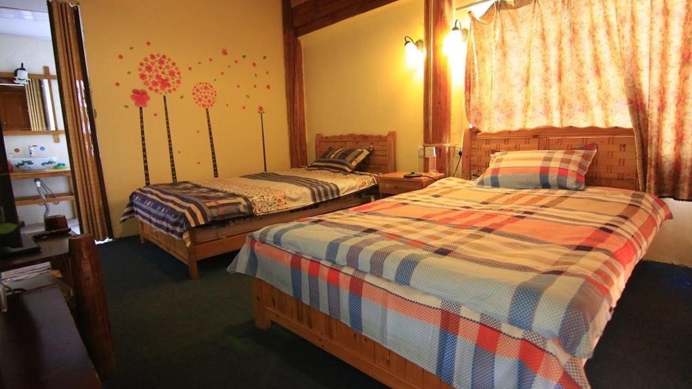 Lijiang Shuhe Shi Wu Wan Hostel